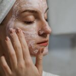 Lady cleansing skin