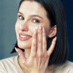 Woman using skincare