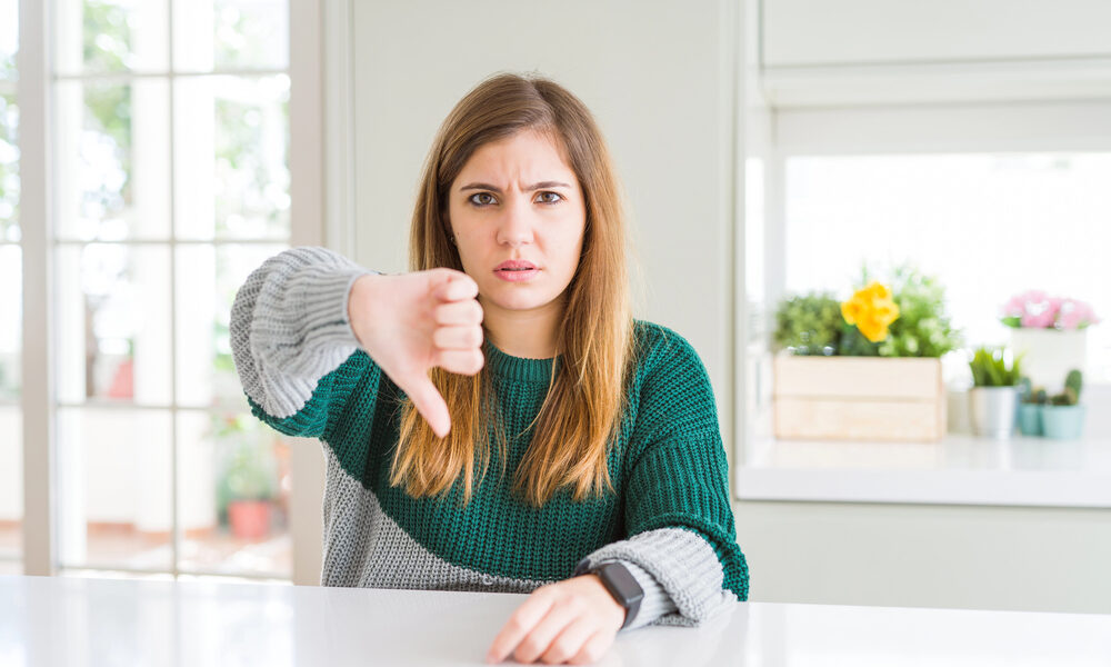 Plus size woman thumb down