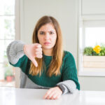 Plus size woman thumb down