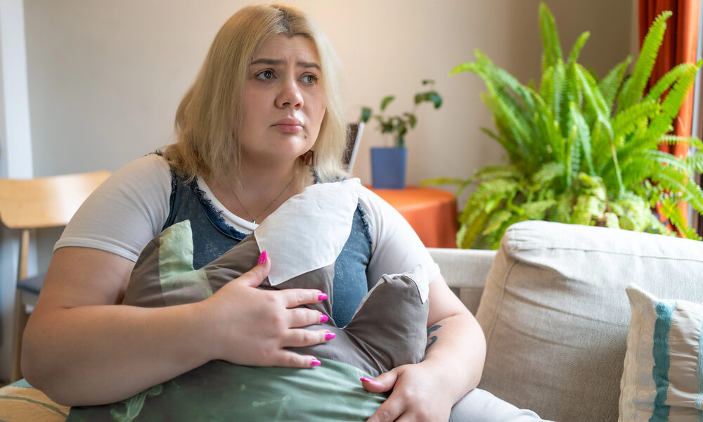 sad plus size woman