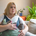 sad plus size woman