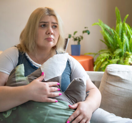 sad plus size woman