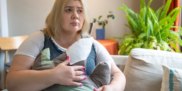 sad plus size woman