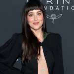Midriff Exposed: Dakota Johnson Stuns in Risqué Dress