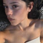 Jenna Ortega's Micro Minidress Hugs Her Thighs While Lounging