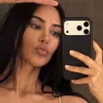 Plunging Snakeskin Bra by Kim Kardashian Struggles to Stay Put