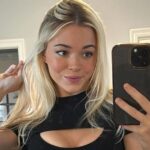 Livvy Dunne's Plunging Top Suspended by Thin Straps