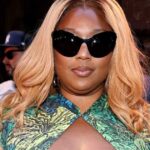 Lizzo's Kim Shui Dress Features Plunging Cutout and Slit at NYFW