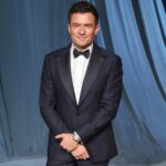 Orlando Bloom Displays Abs on Family Getaway with Kids