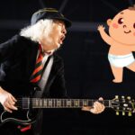 AC/DC's Angus Young Signs Baby at Toronto Pop Up Event