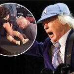 AC/DC's Angus Young Signs Fan's Baby in Toronto