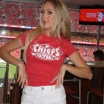 Micro Shorts by Brittany Mahomes Pair Perfectly with Chanel Boots
