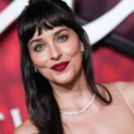 Plunging High-Cut Spanx Bodysuit Worn by Dakota Johnson