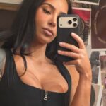 Kim Kardashian Shows Off Curves in Prada Corset Vest