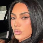Neckline Dips Low on Kim Kardashian's Stunning Outfit