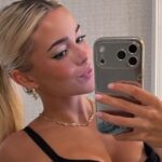 Livvy Dunne Flaunts Legs in Tiny Brown Miniskirt in Tokyo