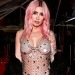 Megan Fox Wipes Tears with Dollar Bills in Lingerie Shoot