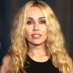 Miley Cyrus Shows Off Curves in Sheer Top and Low-Cut Bra