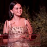 Low-Cut Prada Dress by Selena Gomez Suspended by 2 Straps