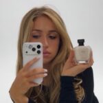 Tate McRae Unveils New Perfume in Bold Topless Wet Look